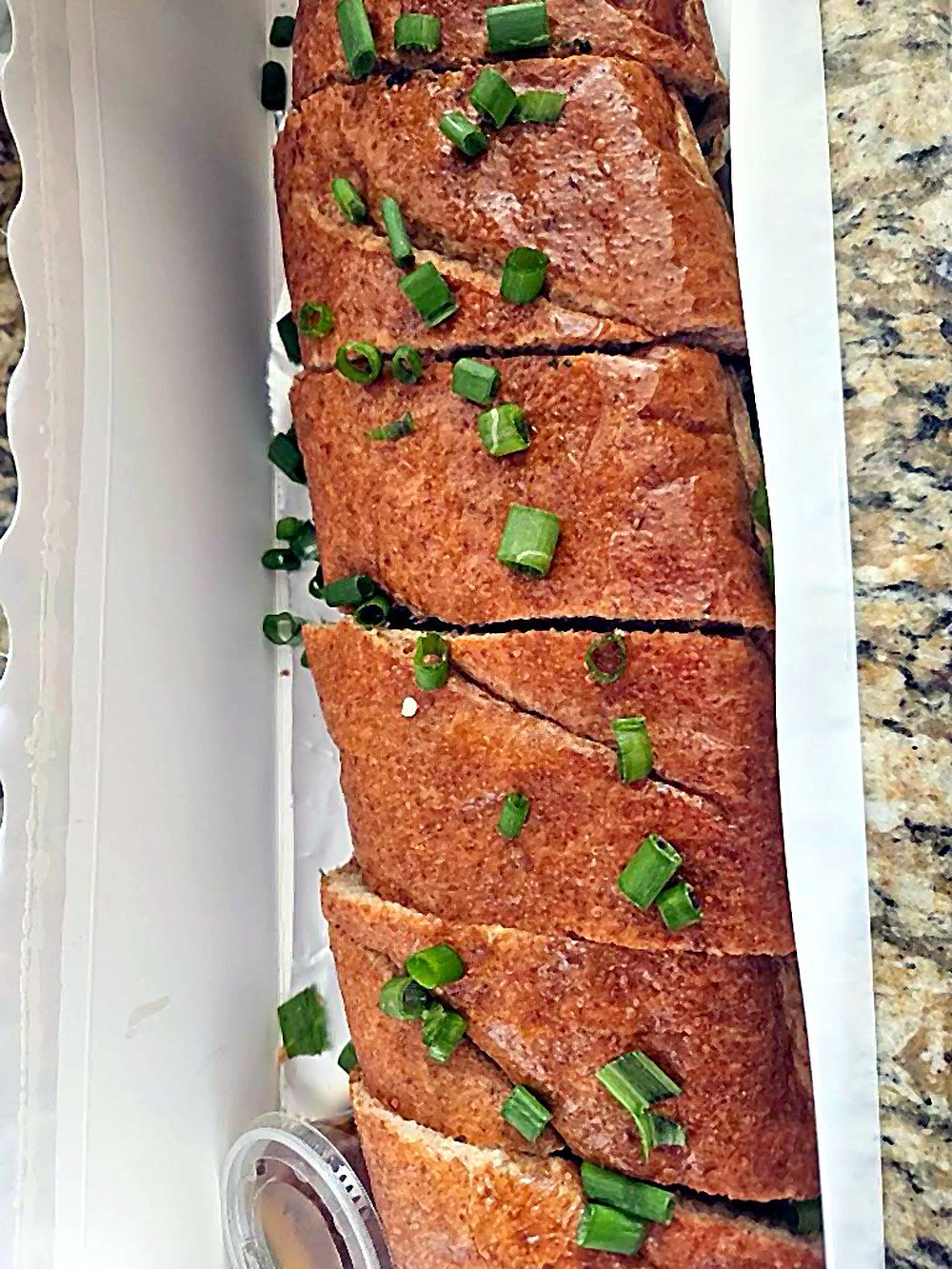 Toasted garlic bread, sliced